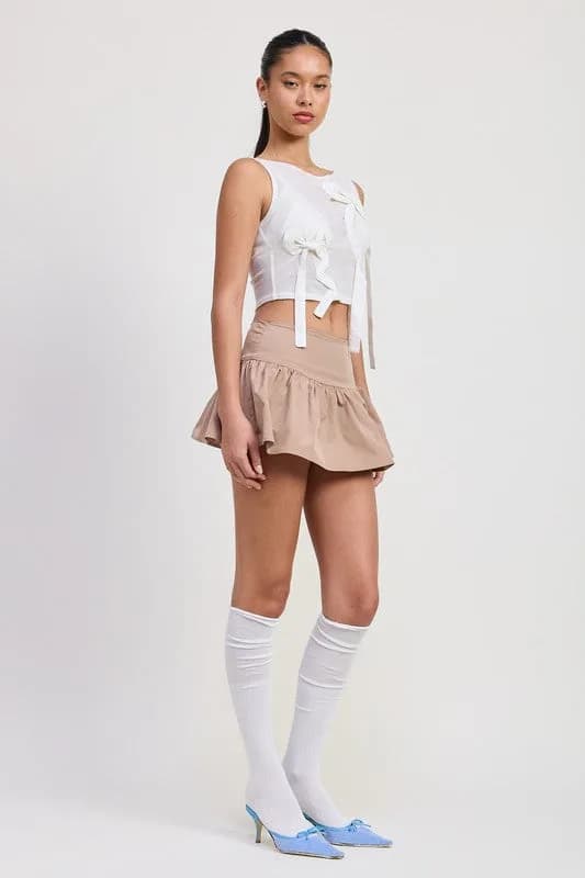 SLEEVELESS SHEER BOW TOP