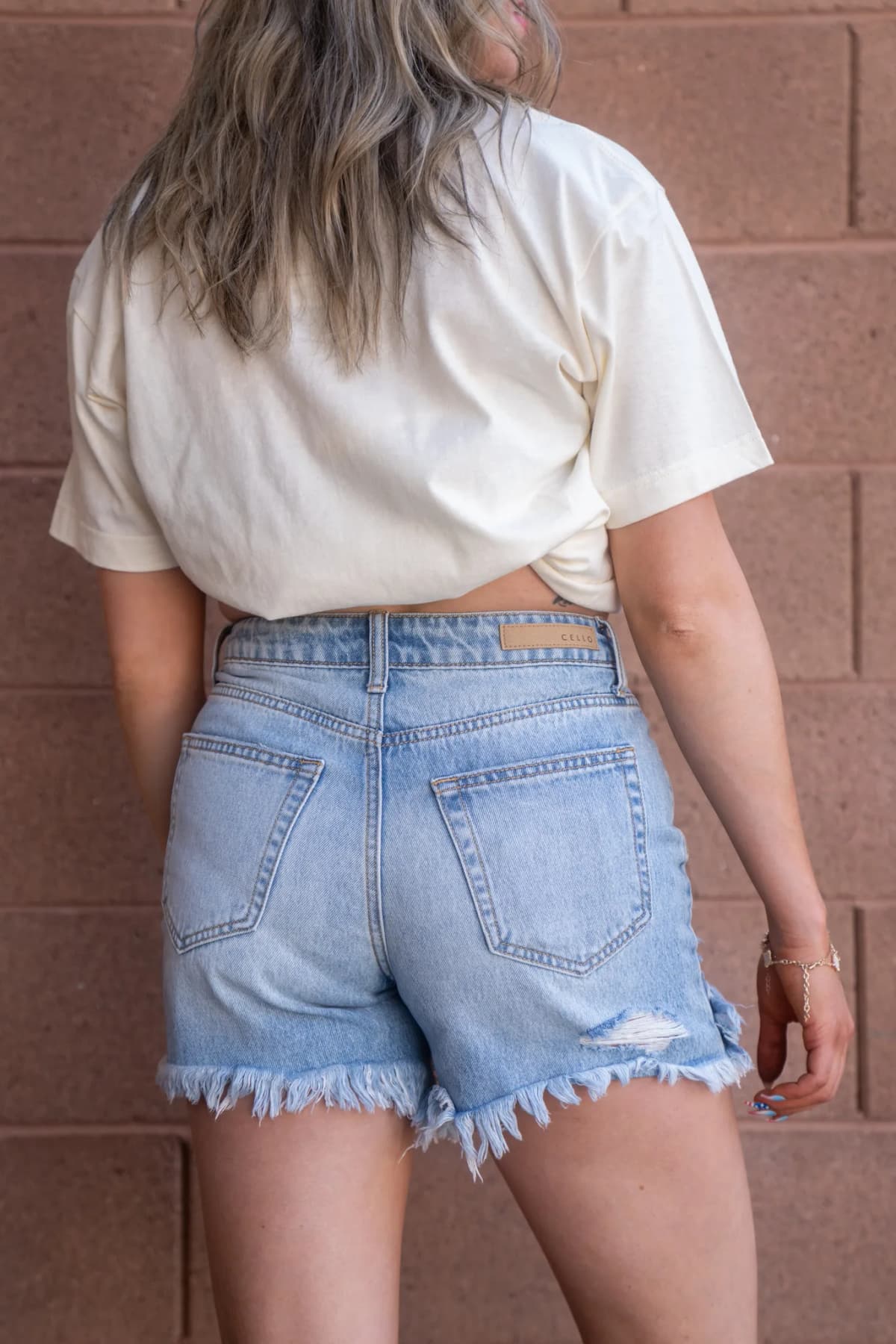 High Rise Uneven Hem Shorts