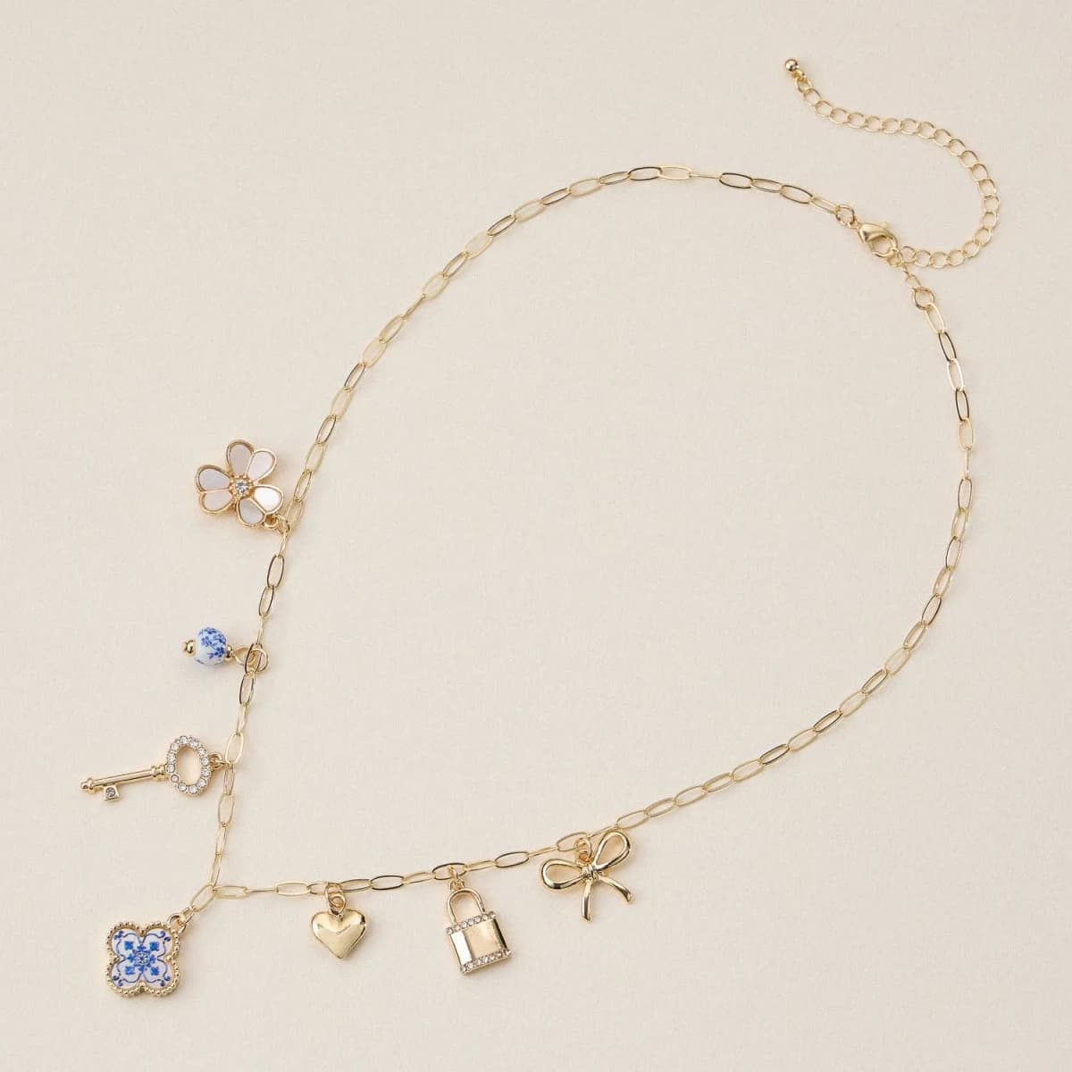 Gold Charm Necklace with Key, Heart, Clover & Floral Accents