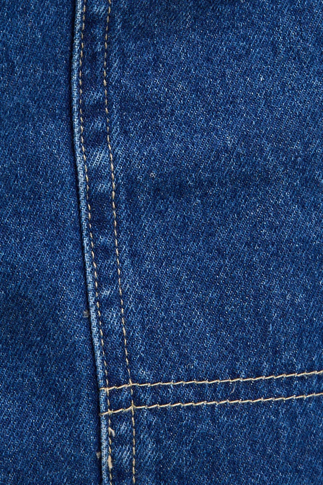 Denim Mid waist Eyelet Detail Tie Mini Skirt by Le Lis