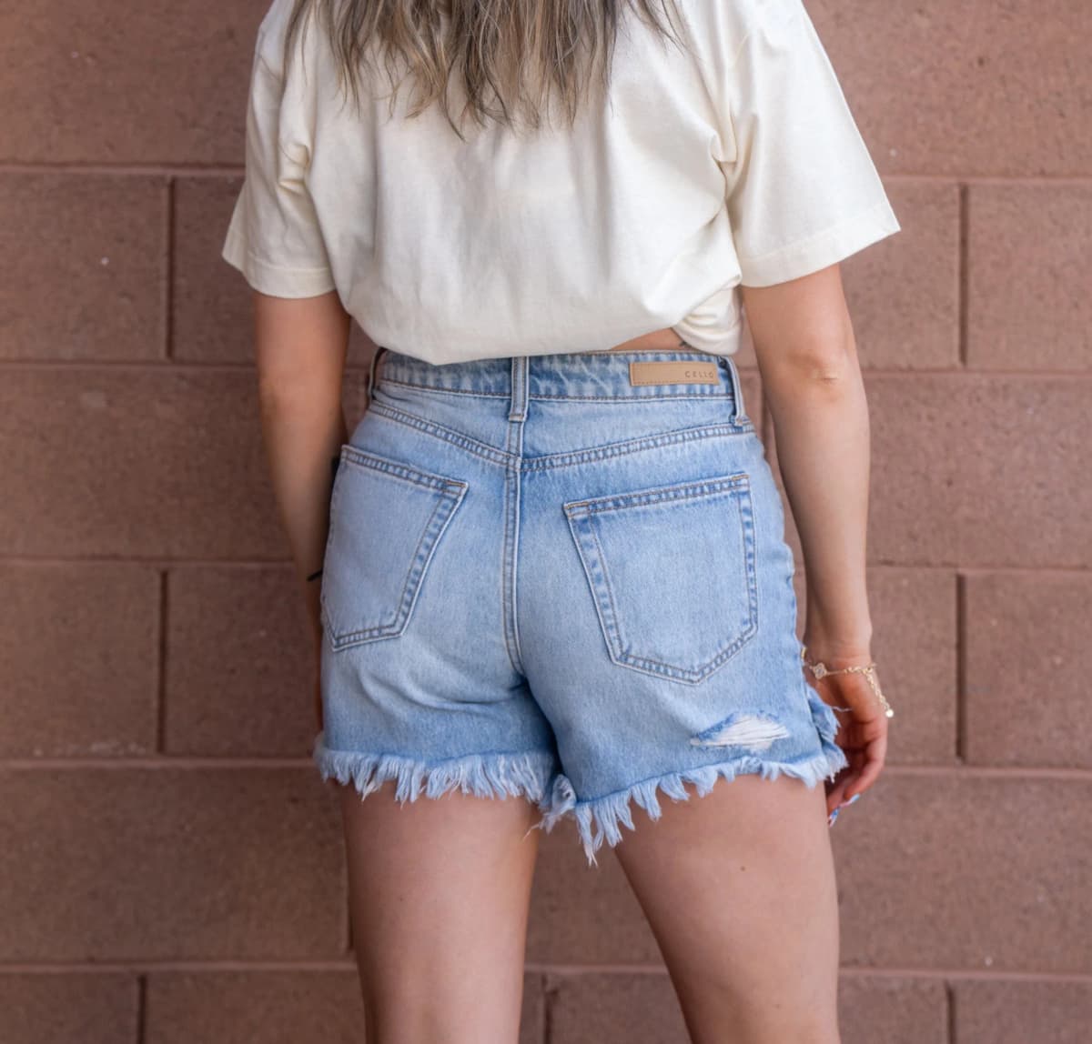 High Rise Uneven Hem Shorts