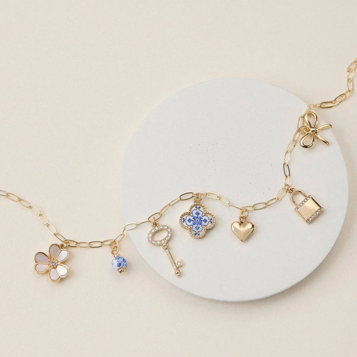 Gold Charm Necklace with Key, Heart, Clover & Floral Accents