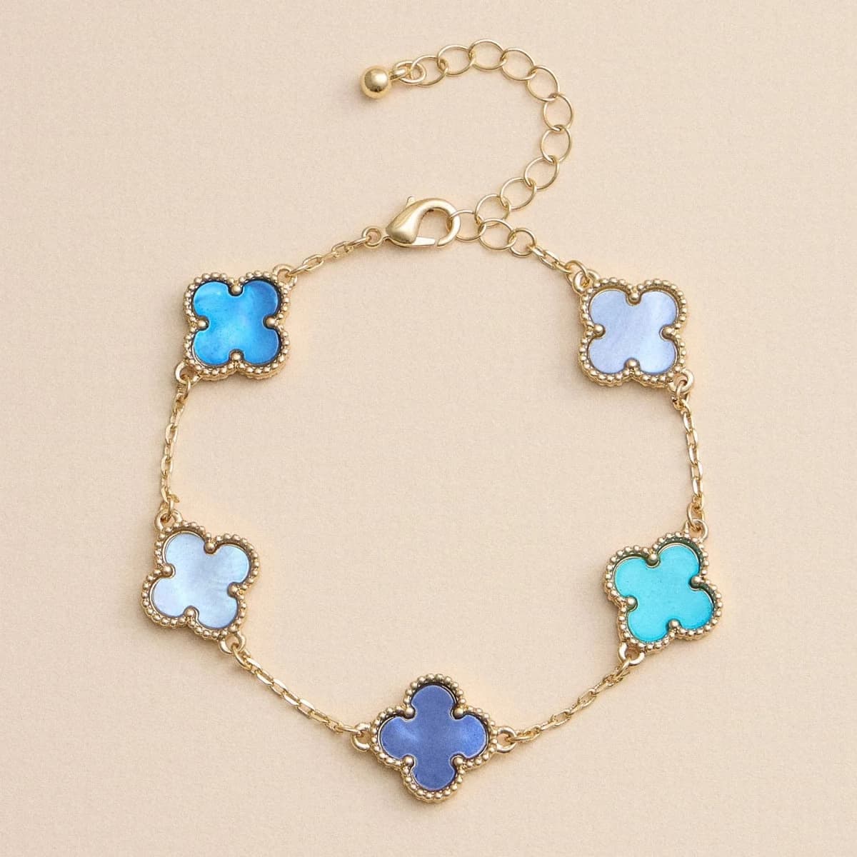 Colorful Shell Charm Bracelet with Gold Detailing: Blue/White