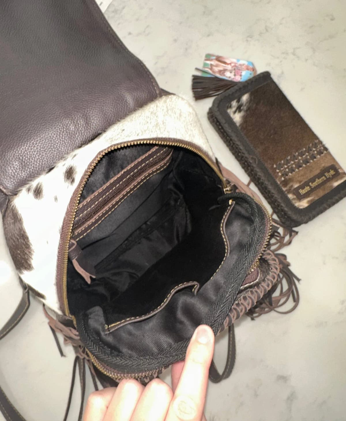 The Jackson Cowhide Backpack by Haute Southern Hyde