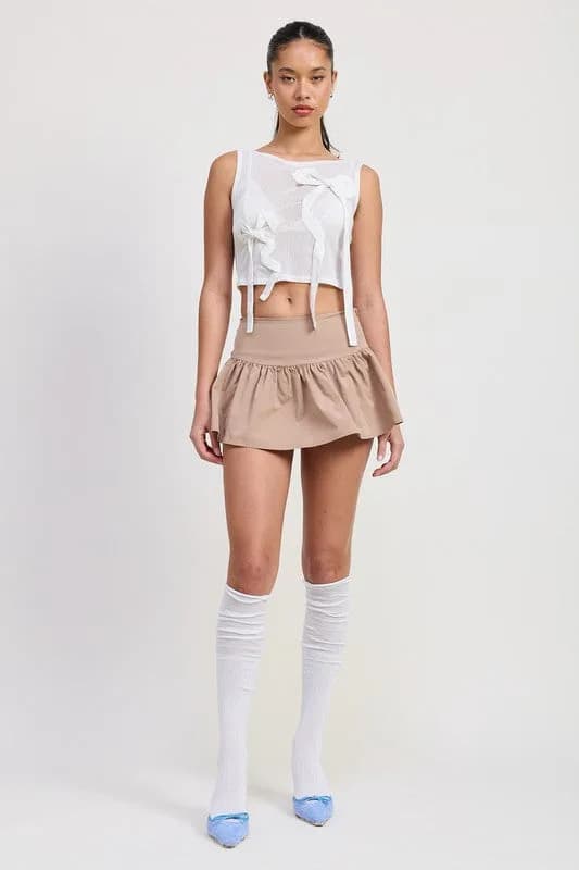 SLEEVELESS SHEER BOW TOP