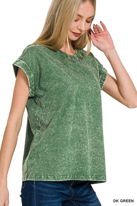 Woman wearing a dark green t-shirt on a white background