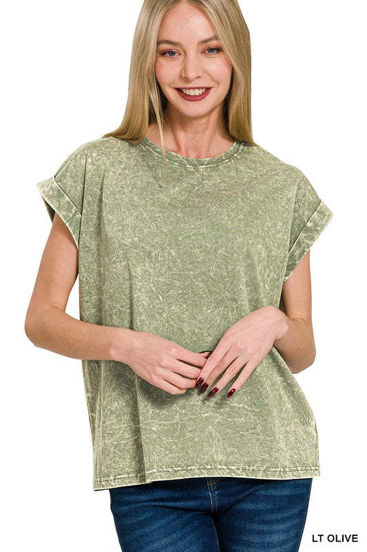 Woman wearing a light olive green t-shirt with short sleeves on a white background